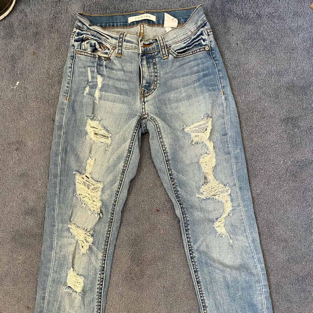 Torn boyfriend jeans